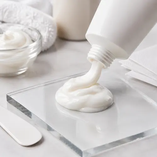 Sensitive skin depilatory cream sample texture review from a cosmetic tube